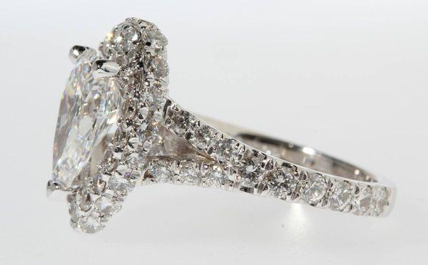 From Phil S. - pear shape diamond ring with dual halo