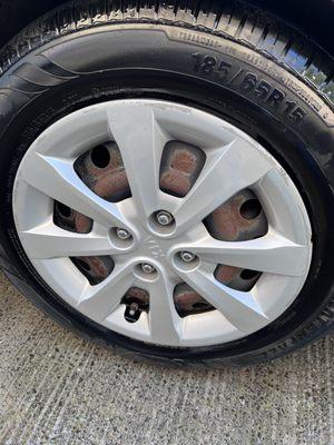 Kia tires after rinse with tire shine applied