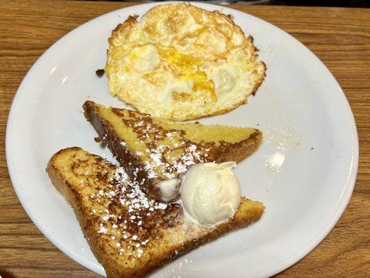 Everyday Value Slam- Eggs fried hard, French toast, and missing bacon getting recooked perfect.  $5.99.