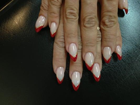 Stiletto Red V-shape nails by Kylie