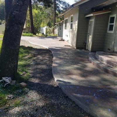 Stamp concrete patio and  steps (rough stone  texture with  multiple release color for a rustic look)