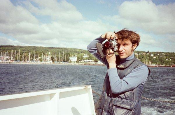 Me (Tom Brody) on ferry boat on way to Madeline Island. Bayfield in distance.