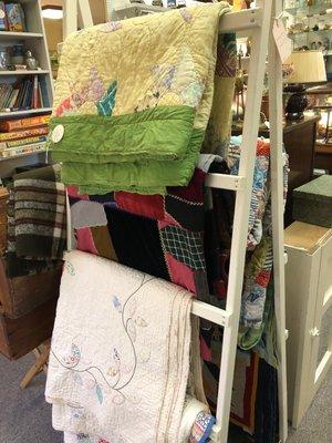 Lots of vintage quilts