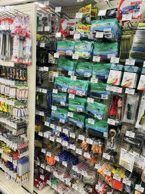 We sell some fishing lures, hooks, weights, and rod/reel combos.