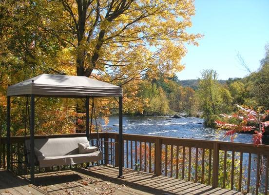 Relax down by the river at Henniker House