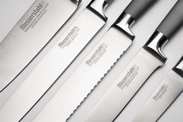 Forged French 440 carbon steel/titanium knives with an UNLIMITED lifetime warranty.