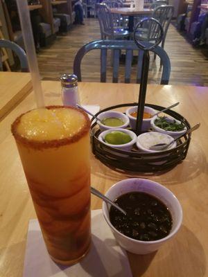 Large Mangorita with the cup of black beans they give you