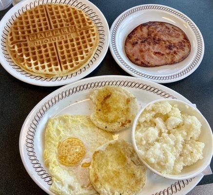 All-Star Special with a classic waffle, city ham, two eggs, a biscuit, and grits