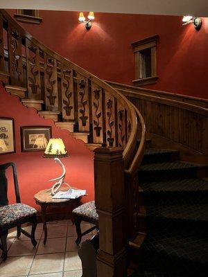 Front inside Stairway leading upstairs to some of the suites