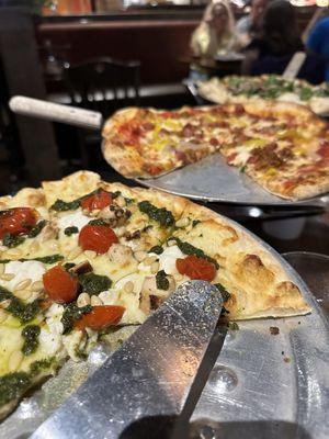 Pesto chicken, diavola, and fig pizza