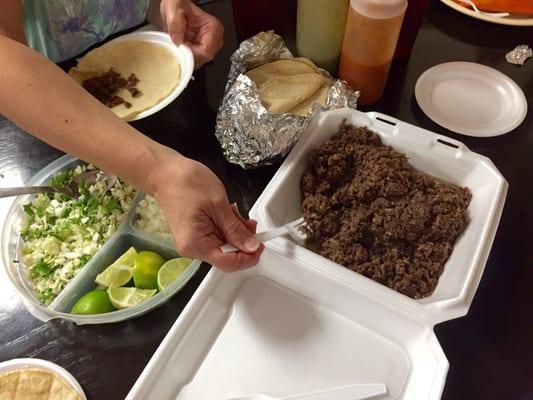 Barbacoa with tortillas and the toppings!