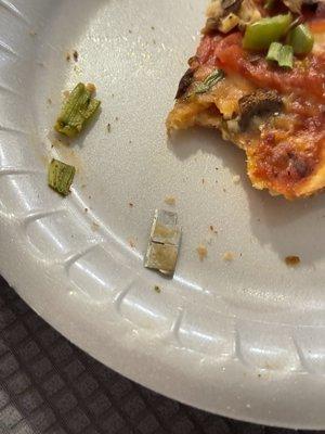 Blade/metal piece in pizza