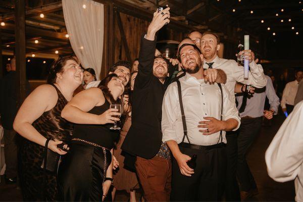 Selfie Song- guests ran around to take selfies with the bride and groom!