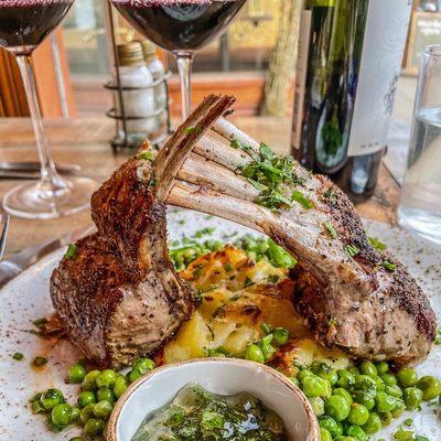 rack of lamb with au gratin  potatoes and minted peas