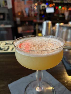 Custom crafted bourbon-mezcal pineapple cocktail