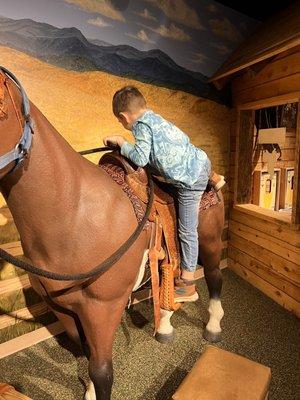 Life size horse for kids downstairs at Sagebrush Ranch.