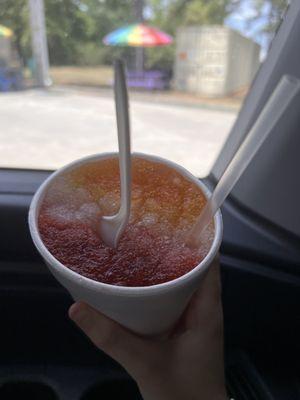 Orange, lemonade, and cherry snow cone