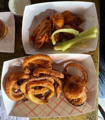 Jumbo Carolina Reaper Wings and xtra crispy onion rings.