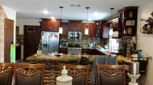 Kitchen lighting, cabinetry and tile work by Jack.