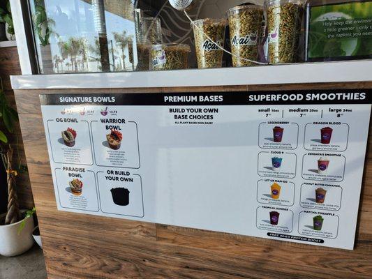 Front of Order Counter. Acai bowls and Smoothies menus.