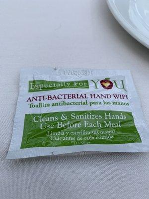 Complimentary hand wipe.