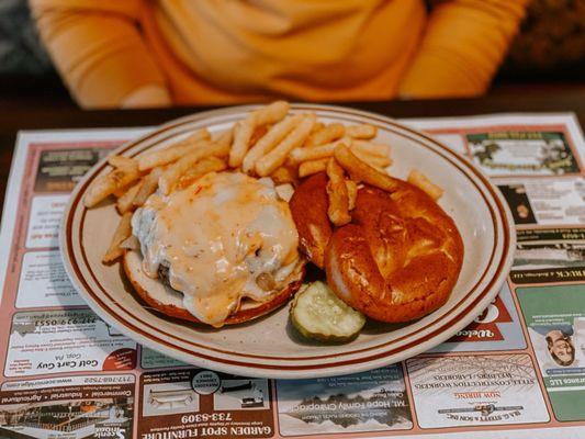 Pretzel bun burger with fries