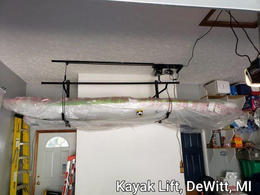 We are suthorized installers of Garage Smart products. Here we installed a 4 position kayak lift.