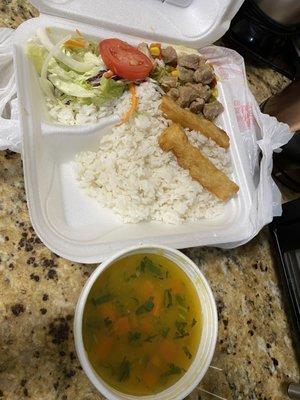 Pork with vegetables, yuca, rice, "salad", and soup