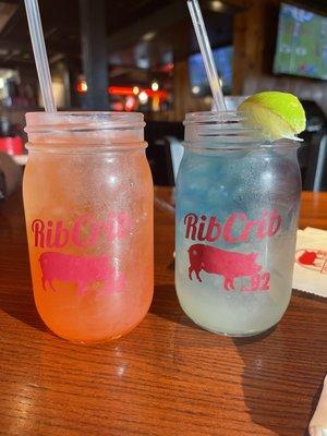 Spiked strawberry lemonade and spiked cherry limeade