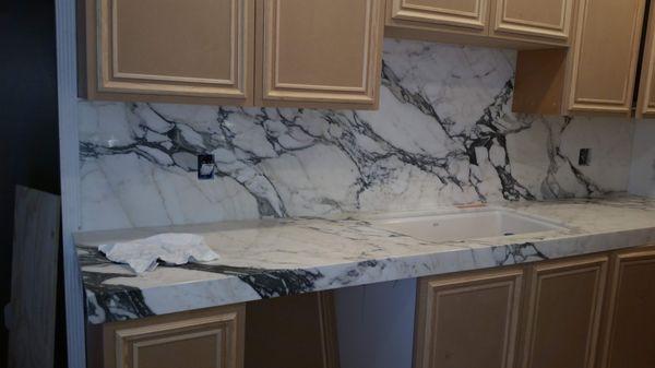 Statuarietto Natural Marble 2 cm polish fabricated with 2.5" miter edge detail profile