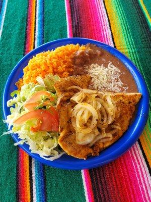 Grilled chicken breast with rice,beans,small salad.