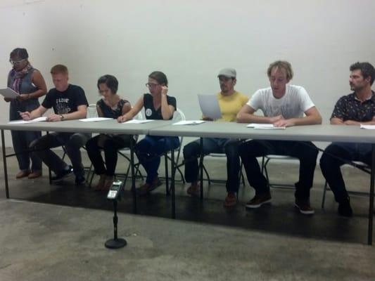 The actors reading the sketch manuscript