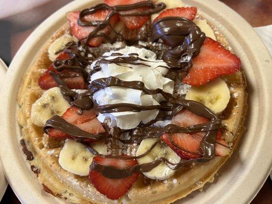 Breakfast Trio Oat waffle with fresh bananas, strawberries & nutella