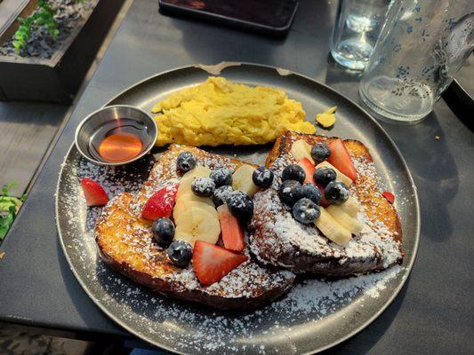 French toast with fresh fruit and eggs