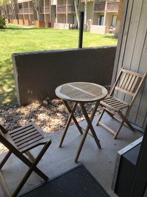 Outdoor seating on a shaded patio