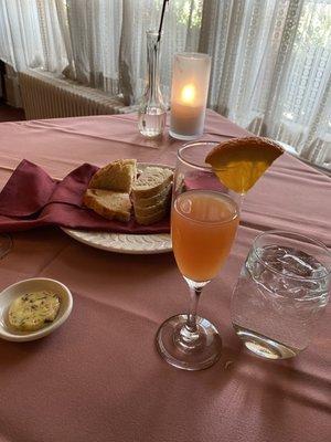 Bread, wildflower butter and berry mimosa