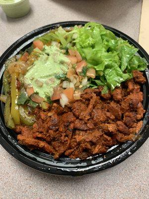 Al Pastor bowl with a rice and pinto beans base. Delicious!