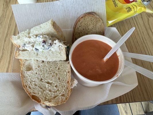 Cranberry Chicken Salad sandwich and a bowl of tomato soup.