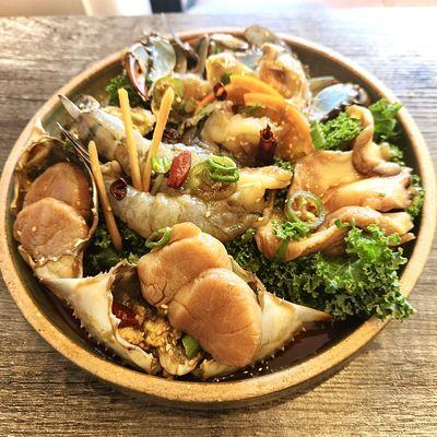 Assorted raw soy marinated seafood including Abalone, Shrimp, Scallop, and Blue crab (모듬장)