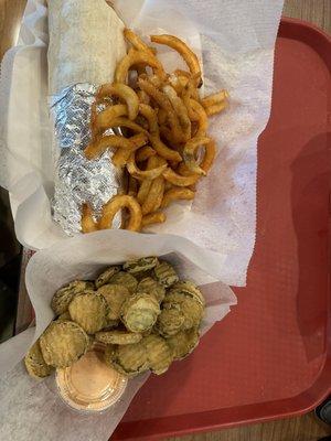 Fried pickles, curly fries, and veggie wrap