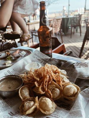 Fried Pelmeni along with mushroom sauce and sour cream and Baltika beer.