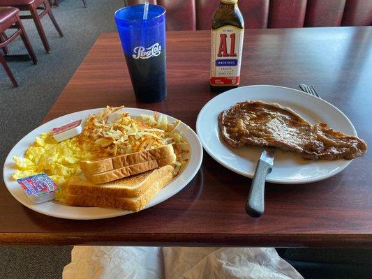 Steak and Eggs with potatoes and toast