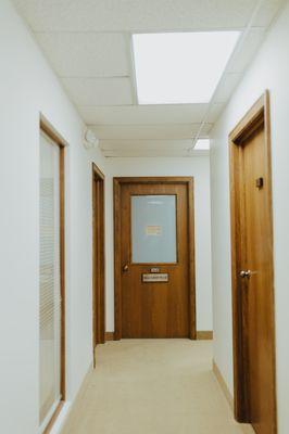 Office door is at the end of the hallway