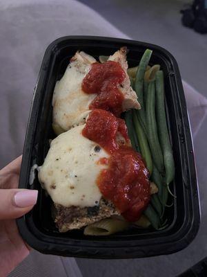 Chicken (paid extra for more protein) with cheese, a tomatoey sauce, and green beans over penne