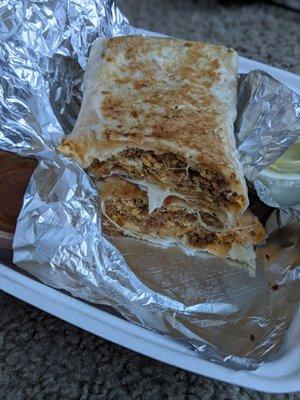 Inside Chorizo breakfast burrito. A lot of meat, not much else going on, not recommended.