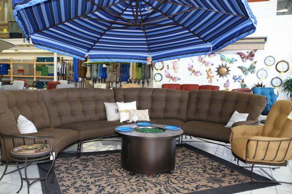 Sectional with fire pit and large umbrella