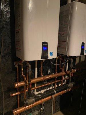 Check out this awesome installation! 2 Navien Water heaters for a customer in Orange, they love NEVER running out of hot water!