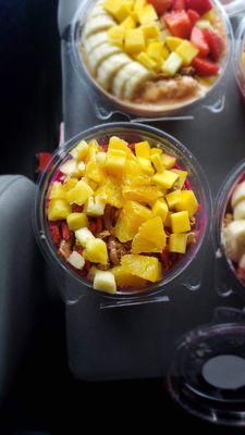 Paradise Bowl -- pitaya w/ orange, pineapple, strawberry, coconut, goji berries, granola, & almond butter