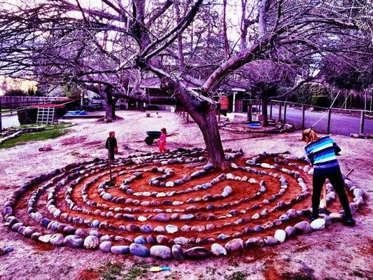 Building the awesome labyrinth that surrounds one of our giant mulberry trees