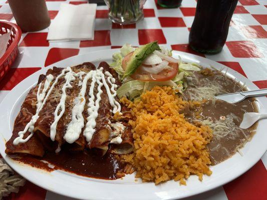 Red cheese enchiladas with onion upon request